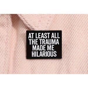 AT LEAST ALL THE TRAUMA MADE ME HILARIOUS Black Enamel Pin NEW